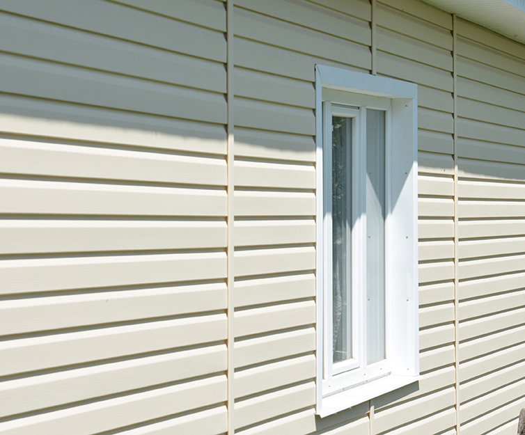 a,close up,on,a,house,with,exterior,vinyl,siding,panels,